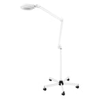 Lampe loupe sur pied, bras articulé déplié