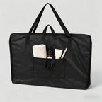 Sac de transport noir pour table de massage pliante, poche avant (accessoires visibles non inclus)